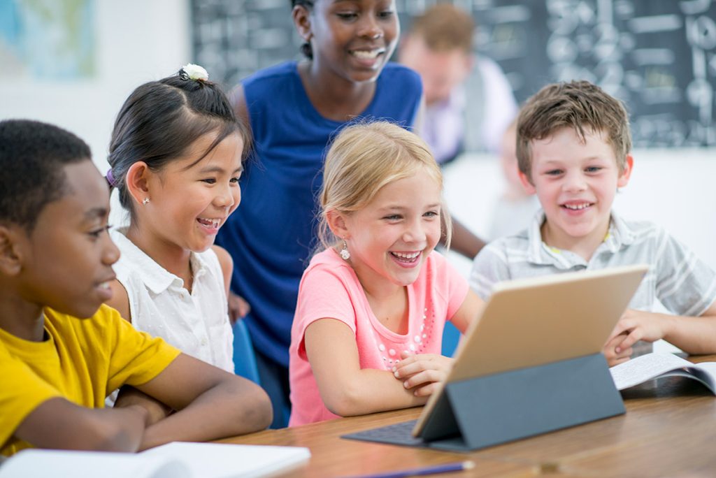 students engaging with text in classroom
