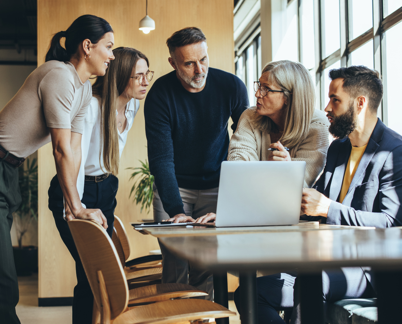 Employees collaborating and problem solving