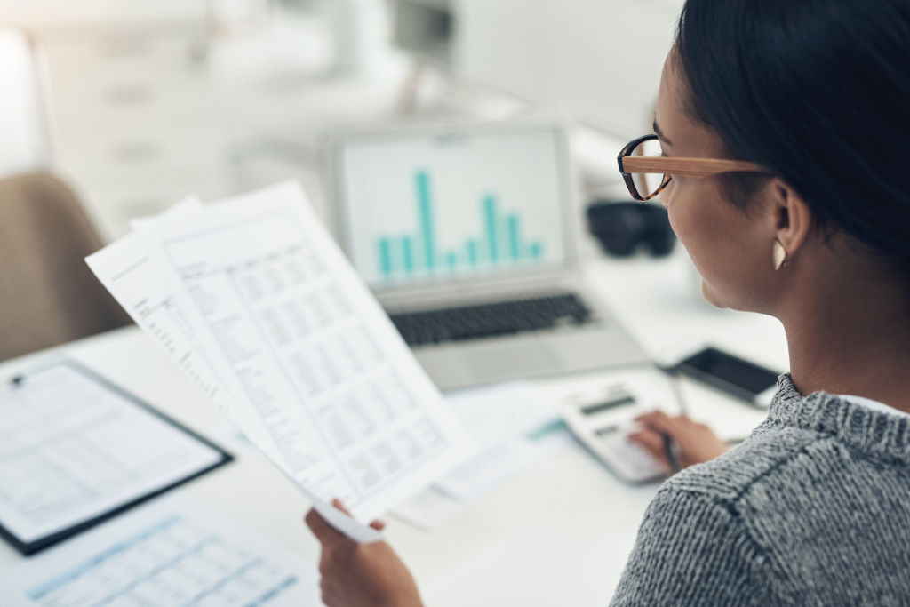 Employee examining data focused documents