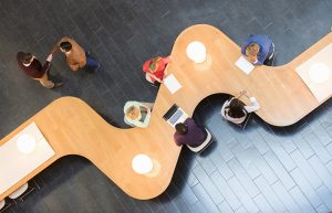 workers collaborating at modern desk