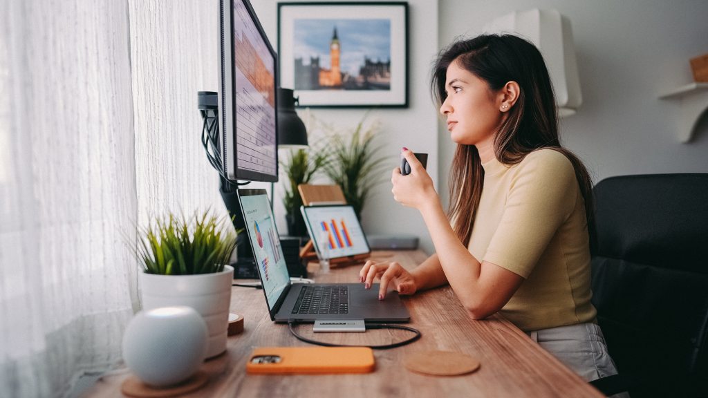 Businesswoman working at home on computer