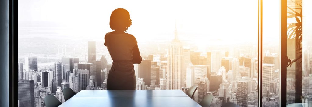 women looking at the city from a high up location