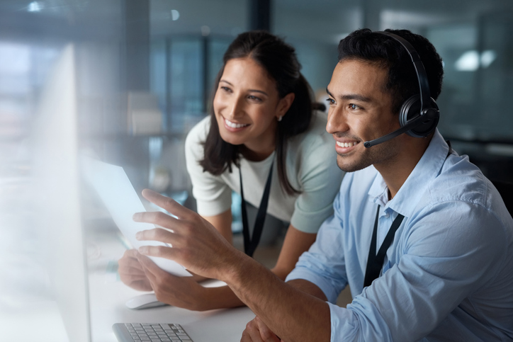 male and female customer service representatives answering inquiries