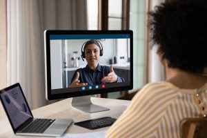 woman on consulting call on laptop
