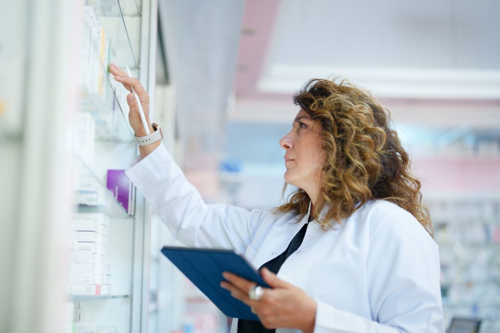 pharma professional using technology R&D