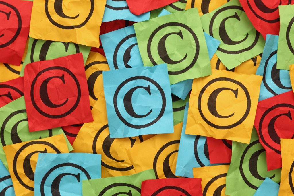 copyright symbol on crumpled sticky notes