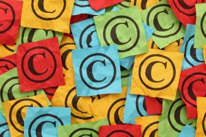 copyright symbol on crumpled sticky notes