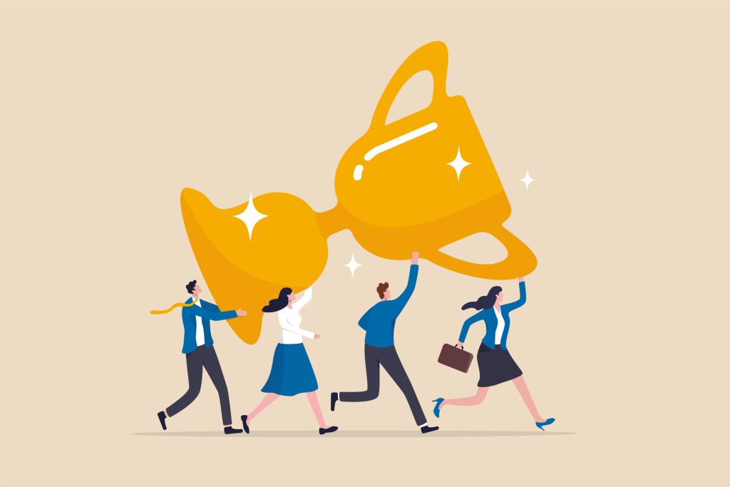 office workers celebrating an award