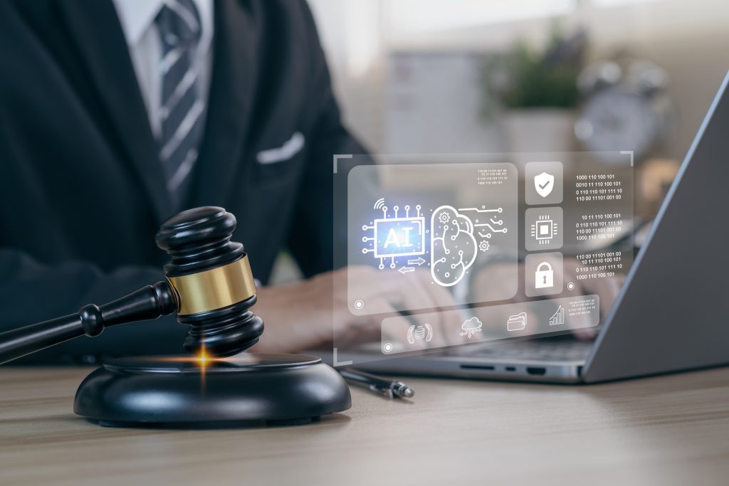Businessman using computer with AI law icon. Compliance, regulation, standard , business policy and responsibility for guarding against unintended bias in machine learning algorithms.
