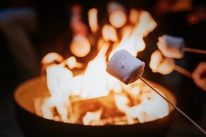 marshmallows roasting on a fire