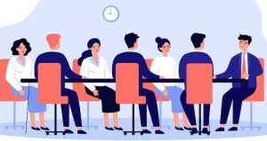 employees meeting at table