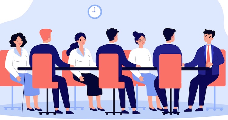 employees meeting at table